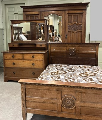 Lot 775 - An Glasgow style Arts & Crafts oak bedroom...
