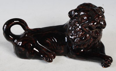 Lot 29 - An antique glazed pottery figure of a...