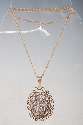 Lot 45 - A yellow, white metal and diamond set oval...