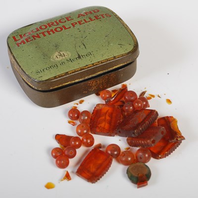 Lot 82 - A small collection of assorted amber beads and...