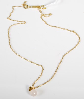 Lot 88 - A 9ct gold necklace suspending a circular...