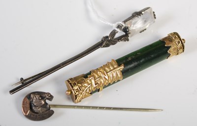 Lot 91 - A New Zealand yellow metal mounted green stone...