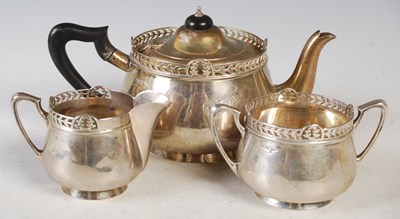 Lot 121 - A Sheffield silver three-piece tea set, makers...