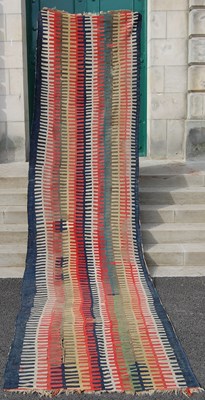 Lot 120A - A blue ground kelim runner, decorated with...