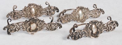 Lot 143 - Four Chester silver Rococo style menu card...