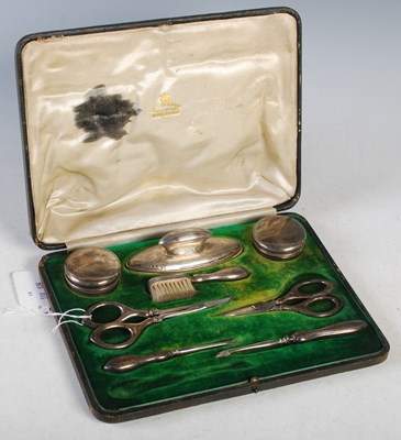 Lot 174 - A Birmingham silver eight-piece manicure set...