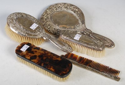 Lot 177 - A Chester silver four-piece dressing table set...