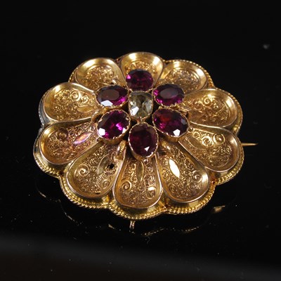 Lot 244 - A 19th century yellow metal and demantoid...