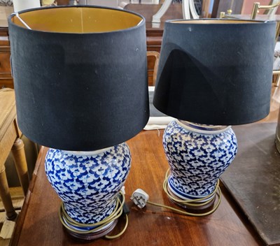 Lot 841 - A pair of 20th century blue and white jars...