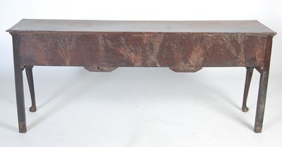 Lot 45 - A George III oak dresser, the rectangular top...