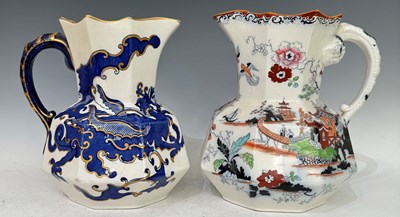 Lot 487 - Two antique Masons ironstone china hydra jugs...
