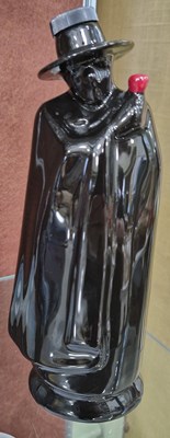 Lot 9 - A Wade pottery decanter in the form of a black...
