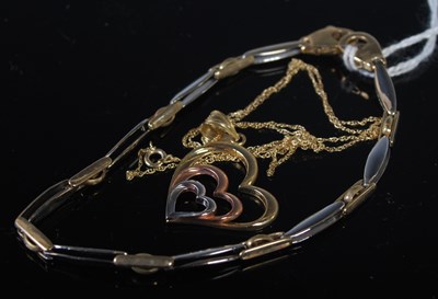 Lot 54 - A white and yellow metal bracelet, stamped...