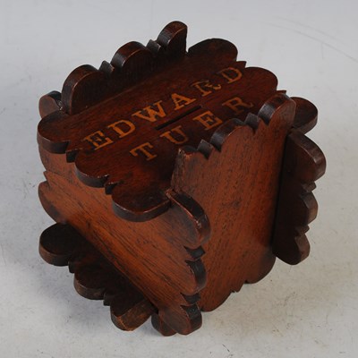 Lot 98 - A mahogany puzzle money bank inscribed ‘Edward...