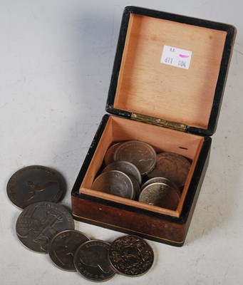 Lot 95 - A leather covered square shaped box containing...