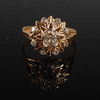 Lot 70 - A vintage yellow metal and diamond set nine...