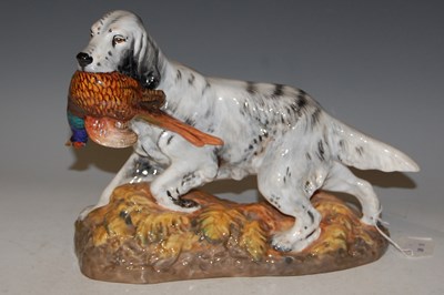 Lot 17 - A Royal Doulton figure of a spaniel retrieving...