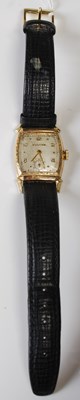 Lot 51 - A vintage yellow metal cased Bulova...