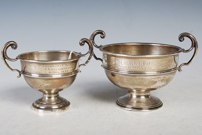 Lot 128 - Two Birmingham silver twin-handled trophy cups,...