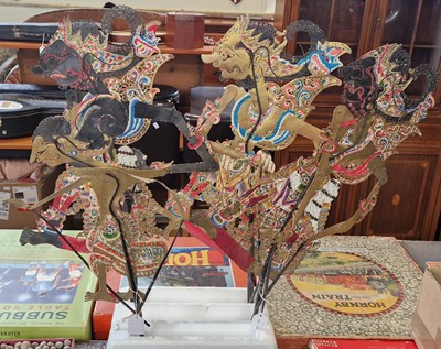 Lot 414 - A group of four vintage Indonesian themed...