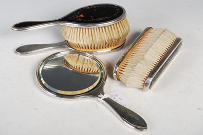 Lot 161 - A London silver five-piece dressing table set...